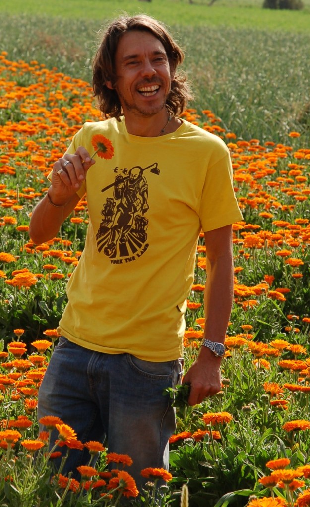 Sebastian in a field of organic Marigolds copy